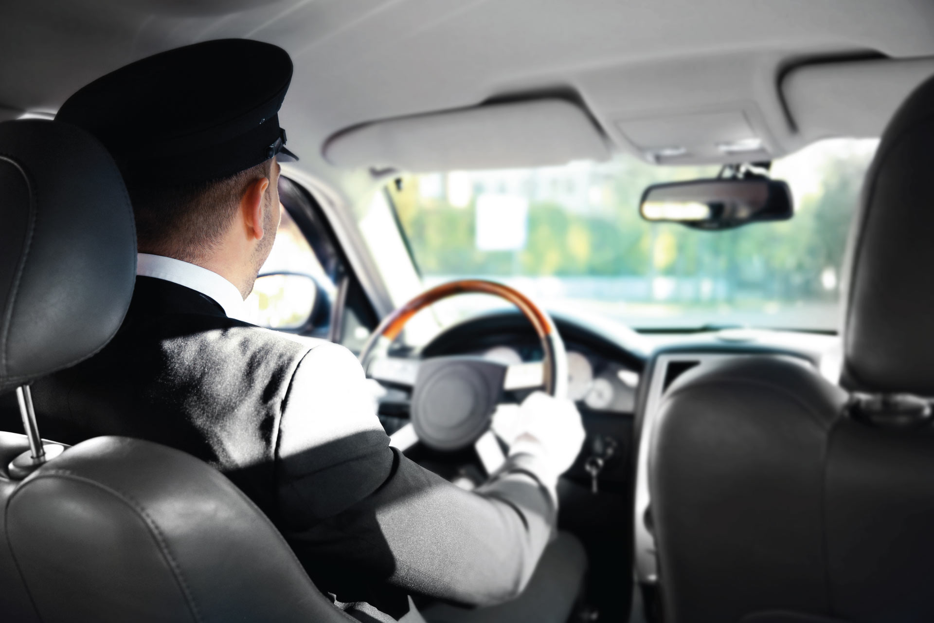 Chauffeur sitting on a driving seat